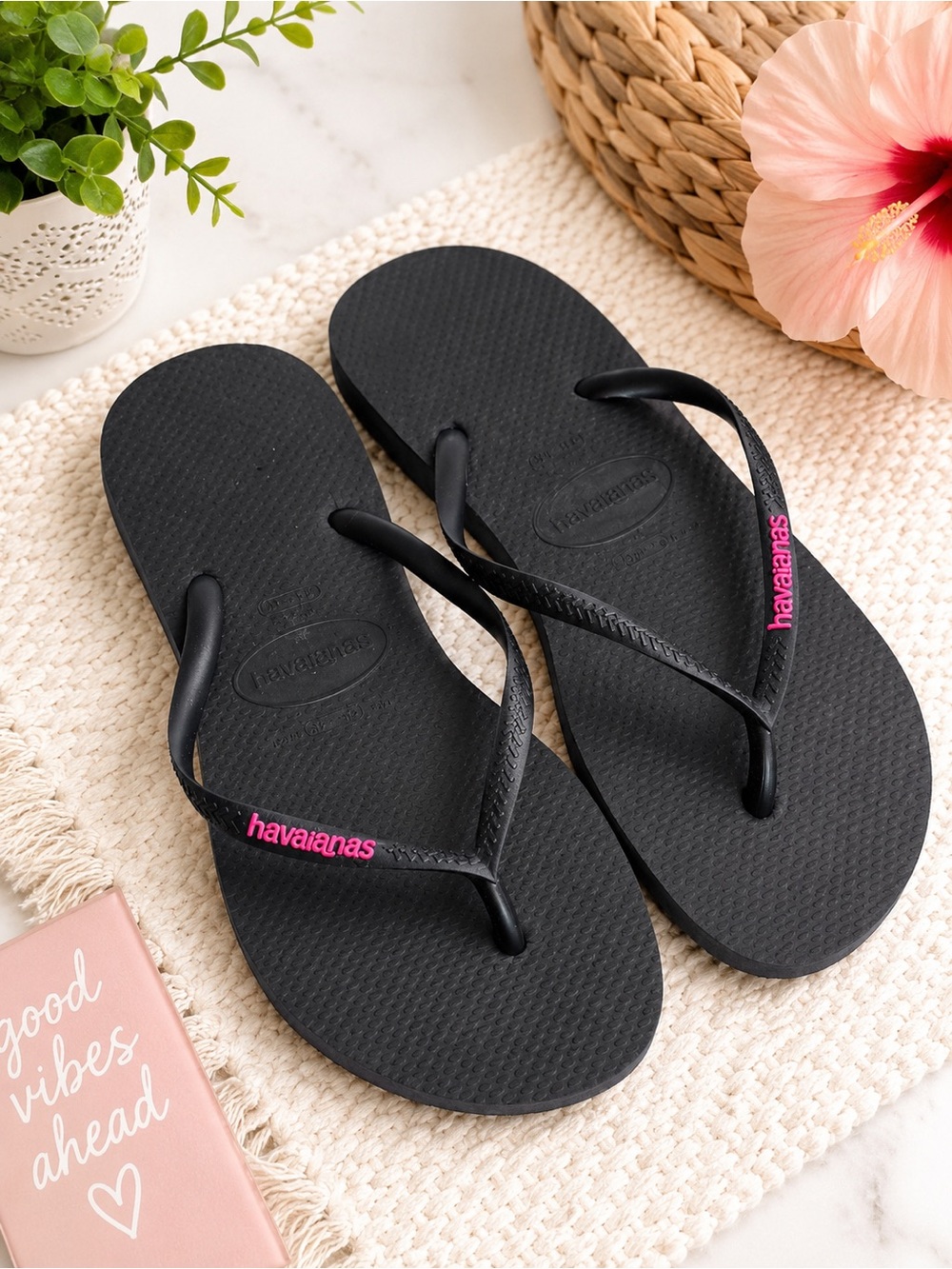 Havaianas Women’s Black Flip Flops with Pink Logo